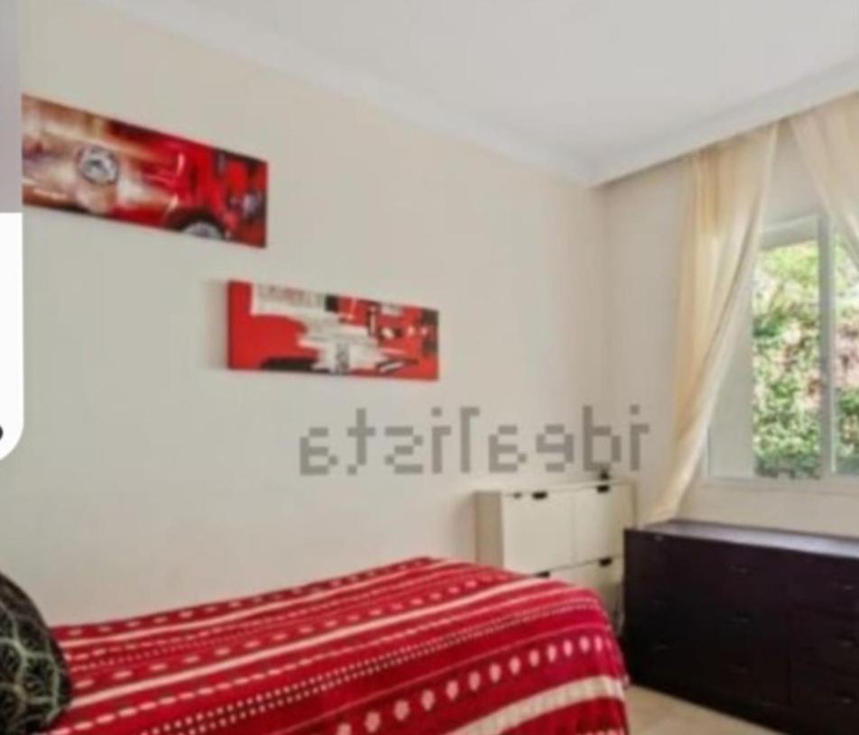 Bedroom, With A Share Bathroom In A Bed And Breakfast Place Alloggio in famiglia Málaga